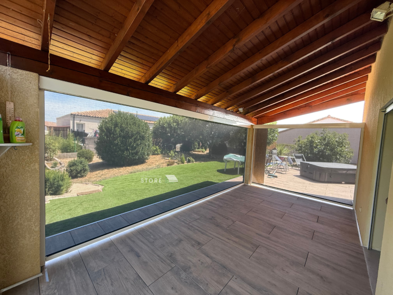 Installation de stores zip motorisés avec toile technique Mermet – Protection solaire hautes performances à Chomérac (07210)