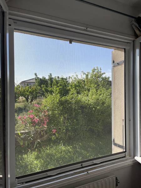 Moustiquaire verticale pour fenêtre à Saint-Péray